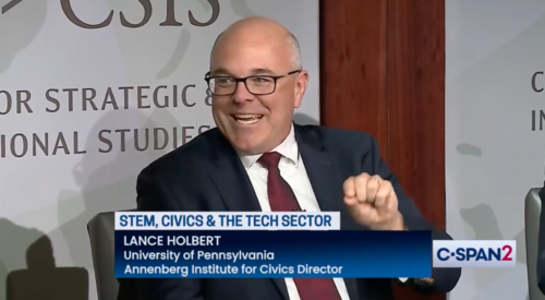 Picture of Lance Holbert smiling as he discusses civics education on an October 2024 civic education panel.